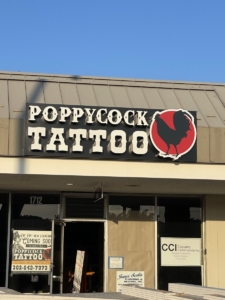 Aerial Signs and Awnings Poppycock-Tattoo-225x300 Poppycock-Tattoo 